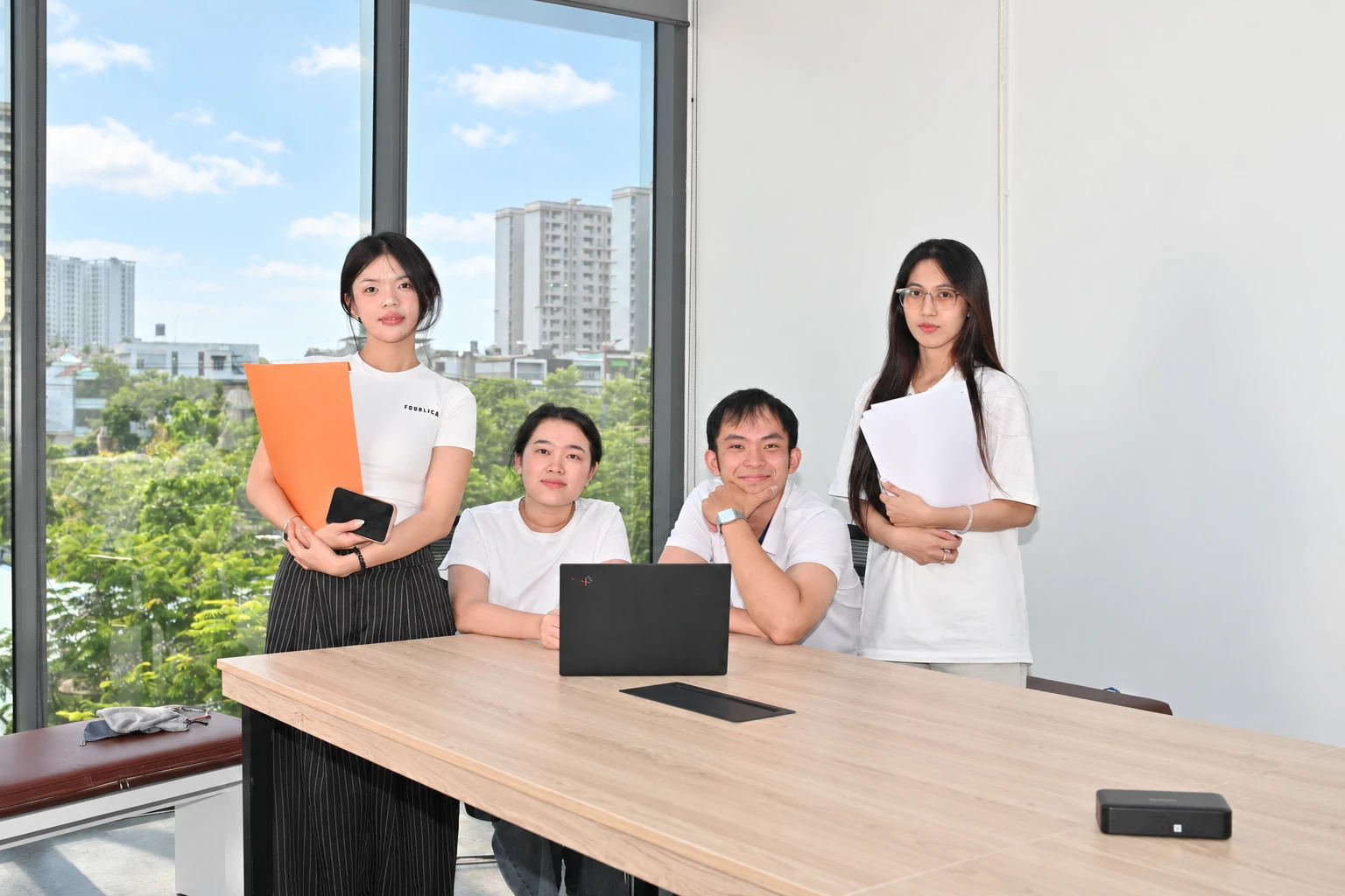 Team members together at the office